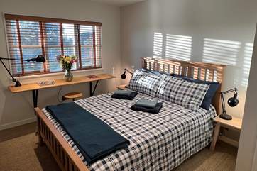 Bedroom 1 has a comfy king-size bed.