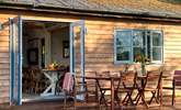 Step outside to dine in warmer weather or indoors in cooler months. - Thumbnail Image