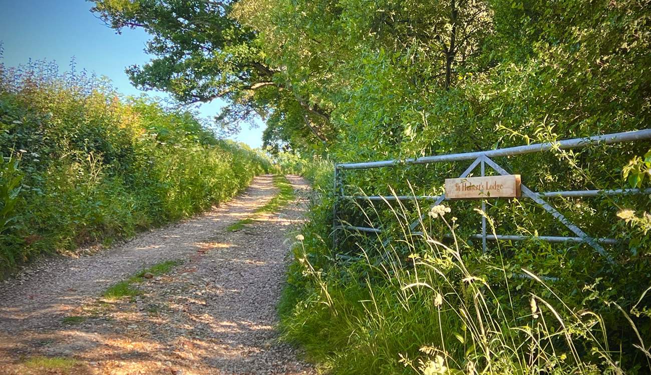 The private lane leads to St Hubert's Lodge and Underwood Cabin.