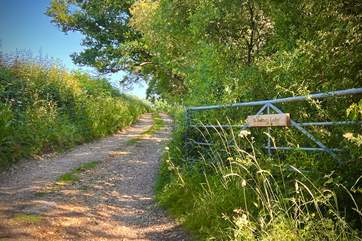 The private lane leads to St Hubert's Lodge and Underwood Cabin.