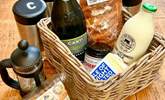A thoughtful welcome basket with locally sourced goodies will be waiting for your arrival. - Thumbnail Image
