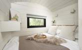 The sumptuous bed and luxurious linens promise a peaceful night's sleep.  - Thumbnail Image