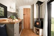 Pippin is unbelievably cosy with a little wood-burner and a well-equipped kitchen.