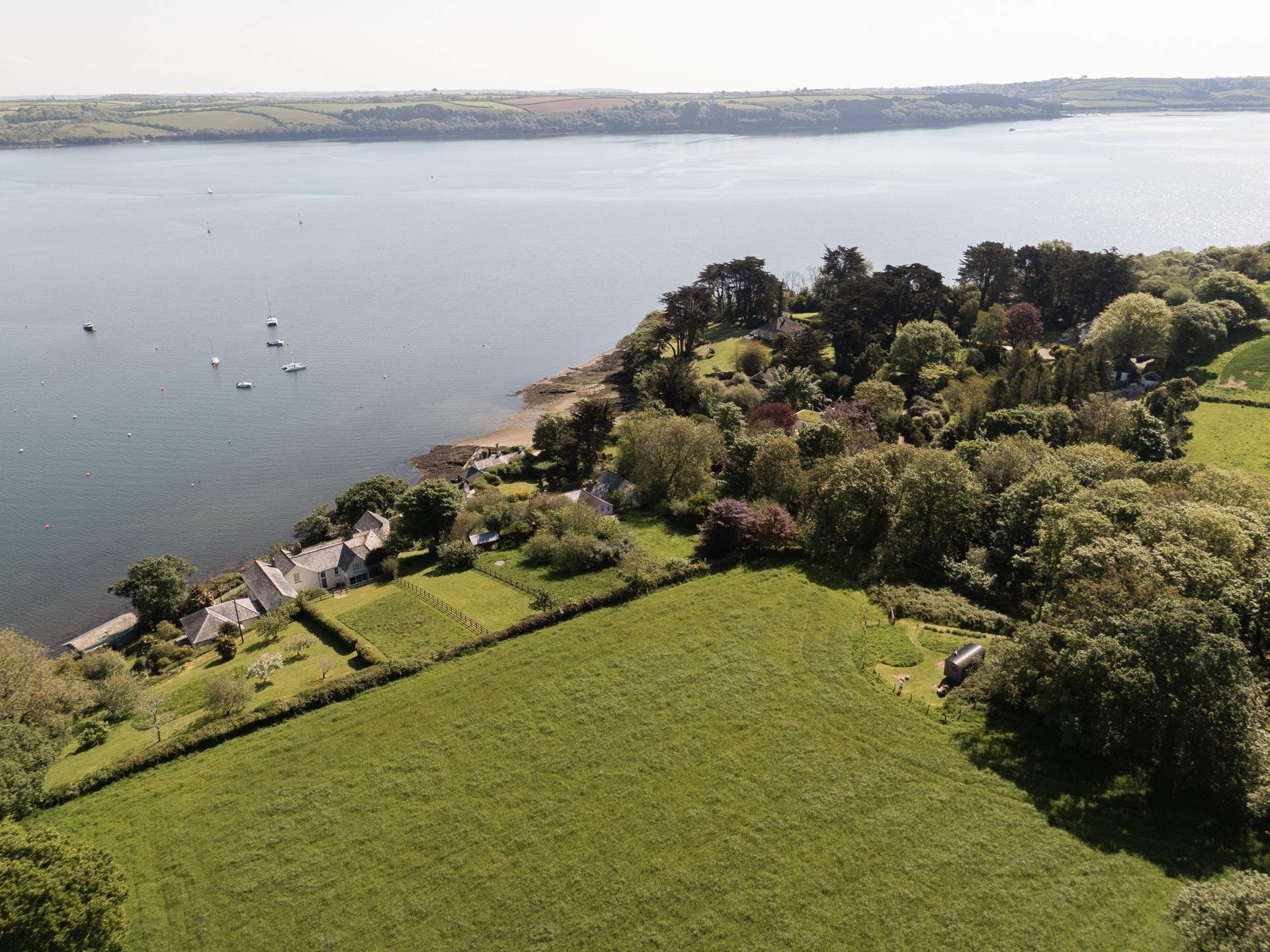 Tucked away in blissful countryside and just footsteps away from tranquil waters. 