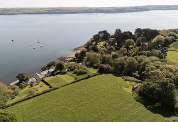 Tucked away in blissful countryside and just footsteps away from tranquil waters. 