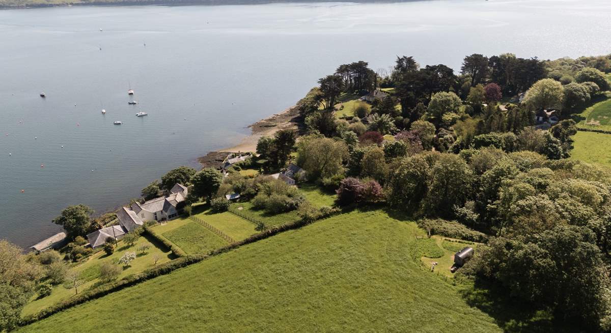 Tucked away in blissful countryside and just footsteps away from tranquil waters. 