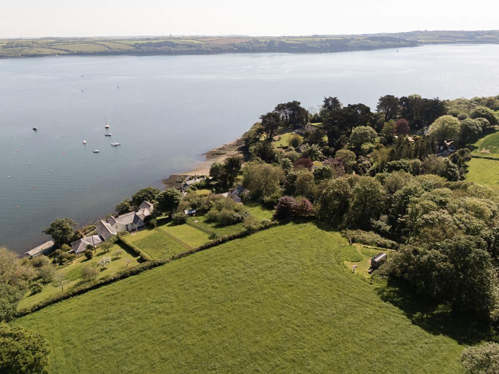 Tucked away in blissful countryside and just footsteps away from tranquil waters.