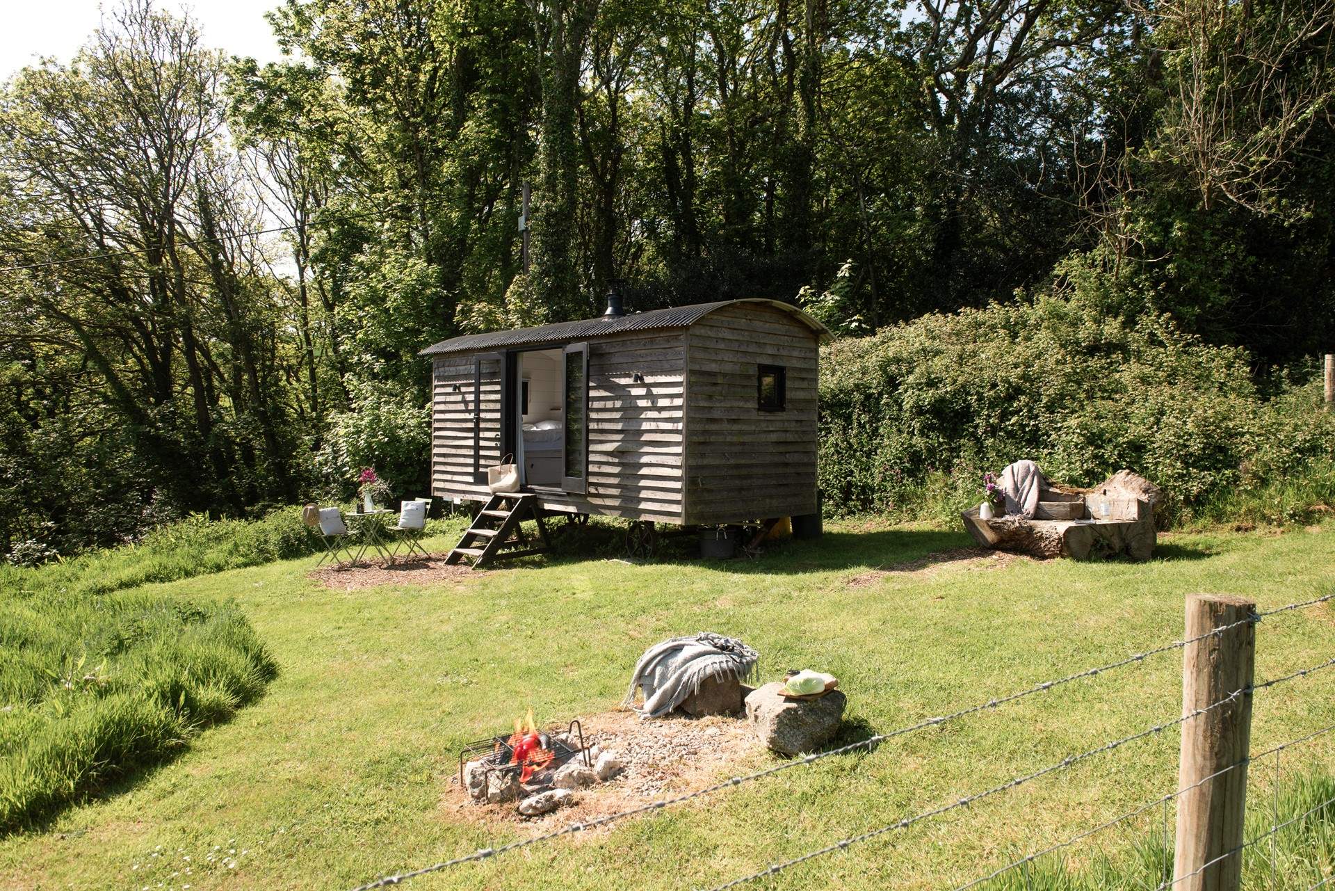 The fire pit also doubles up as a BBQ. 
