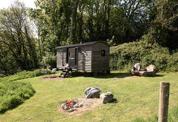 The fire pit also doubles up as a BBQ. 