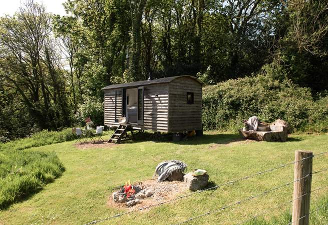 The fire pit also doubles up as a BBQ. 