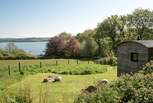Welcome to Pippin, a truly charming hut, tucked away in a peaceful meadow with endless sea views... 