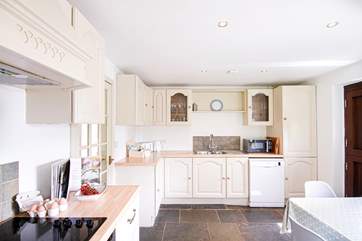 There is everything you might need for a feast in this farmhouse-style kitchen.