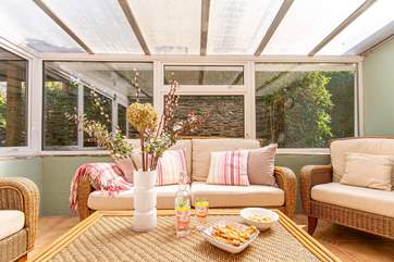Enjoy the winter sunshine in the conservatory.