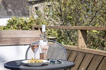 Enjoy a glass of something special in the evening sun.