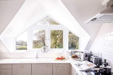 The kitchen area has the most amazing outlook with far reaching views of the sea.