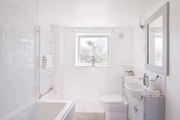 The modern bathroom is on the ground floor.