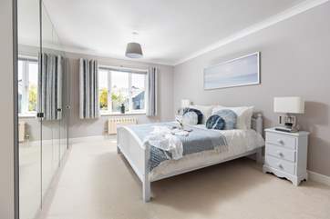 The fabulous main bedroom takes up the whole first floor.
