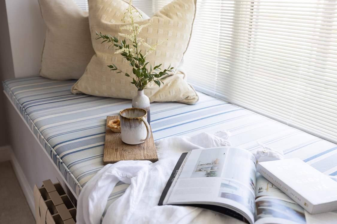Delve into your favourite book on the beautiful window seat.
