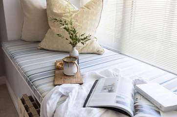 Delve into your favourite book on the beautiful window seat.