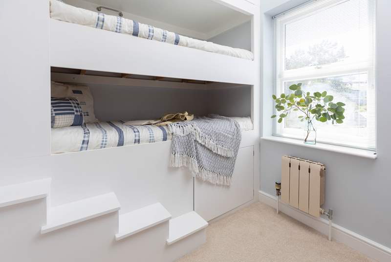 The delightful bunk-beds are perfect for little ones.