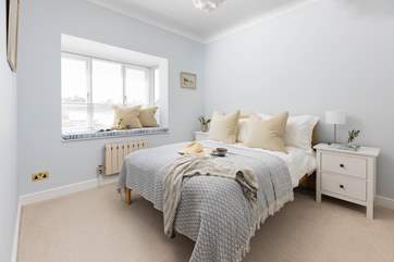 Retreat to the inviting double bed in bedroom two.