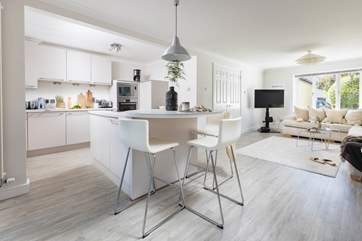 Relax in the crisp, open plan living space.