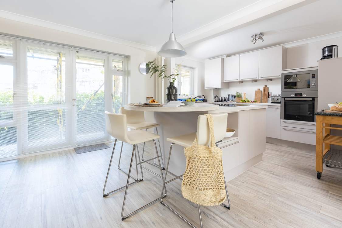 The stylish kitchen is a great place to socialise.