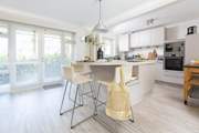 The stylish kitchen is a great place to socialise.