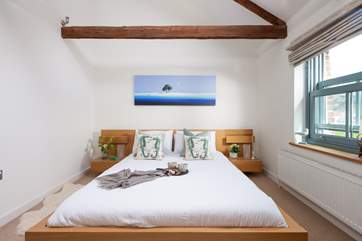 A wonderful king-size bed awaits you in bedroom one