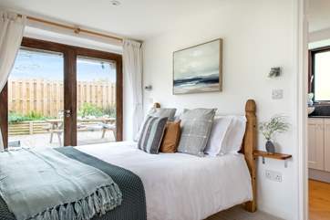 Patio doors lead out to the terrace, ideal for morning coffee or evening sundowners.