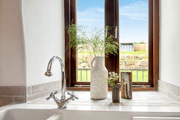 It's not a hardship to be tied to this sink when you can look out onto the garden.