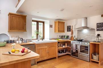 The large range-style cooker in the kitchen is ideal when catering for a crowd.