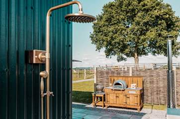 The outside shower is perfect for those hot summers days.