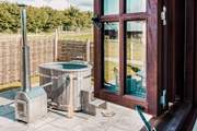 The wood-fired hot tub is a dream.