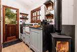 The wood-burner will keep you cosy during cooler months.