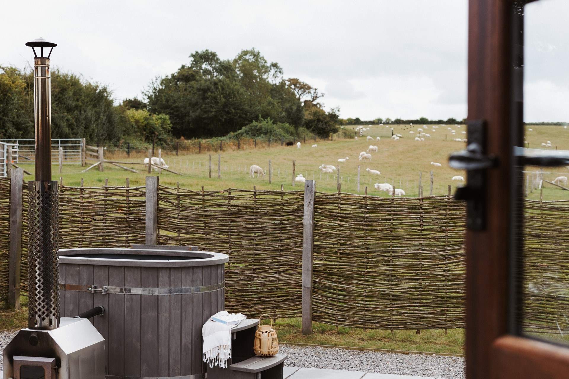 Sink into the heavenly hot tub and say hello to your neighbours who graze quietly in the surrounding fields. 