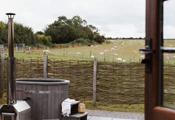 Sink into the heavenly hot tub and say hello to your neighbours who graze quietly in the surrounding fields. 