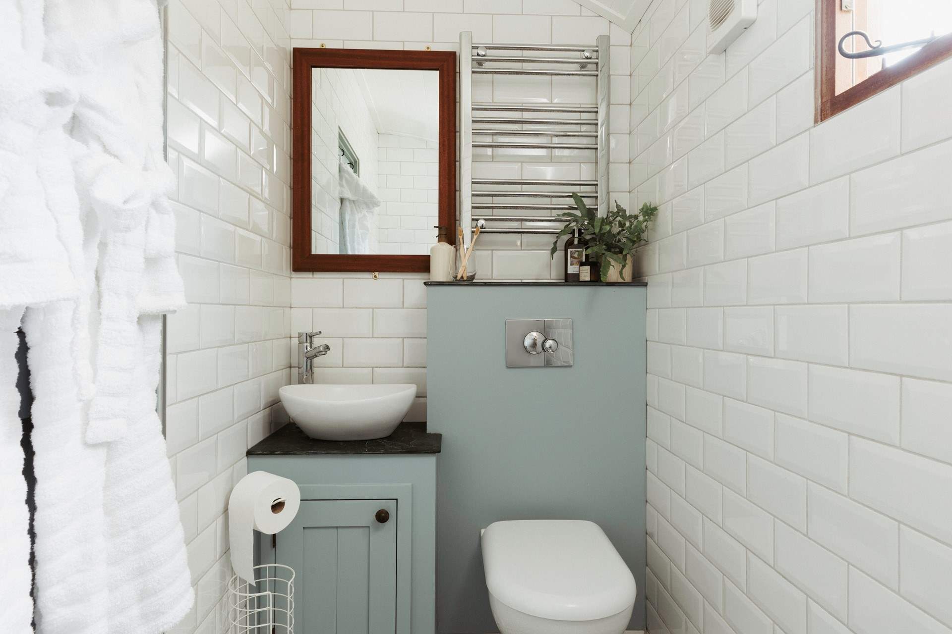 The chic shower room is just the spot for freshening up. 