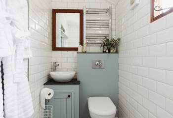 The chic shower room is just the spot for freshening up. 