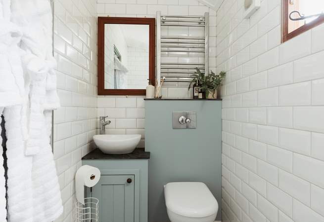 The chic shower room is just the spot for freshening up. 