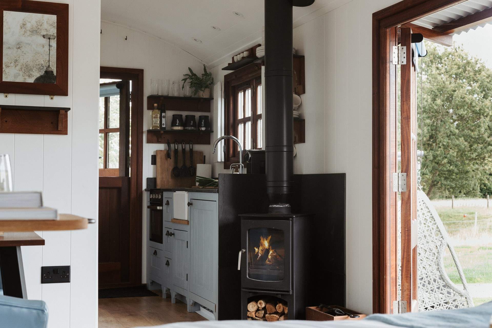 To the right is the well-equipped kitchen. 