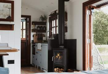 To the right is the well-equipped kitchen. 