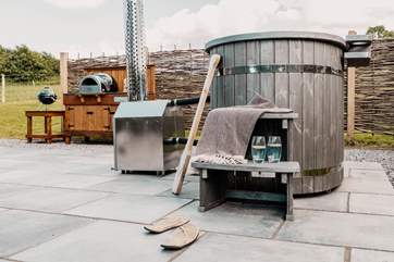 Ah the bliss of your very own wood-fired hot tub where you can soak away your worries and truly relax.