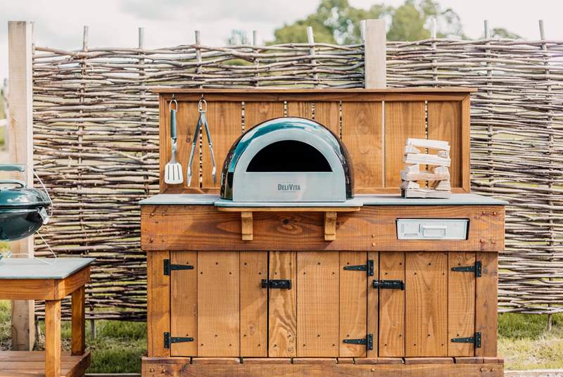 How about this for al fresco cooking? A pizza oven to create your very own Italian delights.