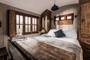 The dreamy bedroom has a king-size bed.