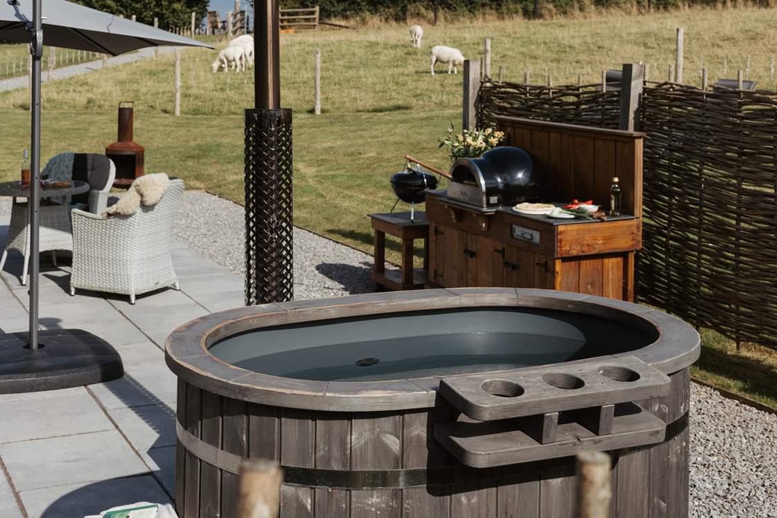 Sink into the steamy tub and say hello to your fluffy neighbours.