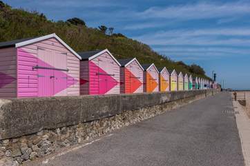 The colourful beach huts along the promenade.