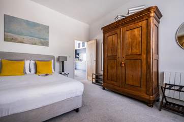 Plenty of hanging space in the wardrobe for clothes.