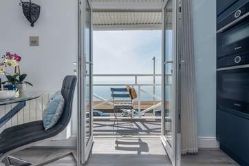 Venture out onto the balcony and watch the world go by.