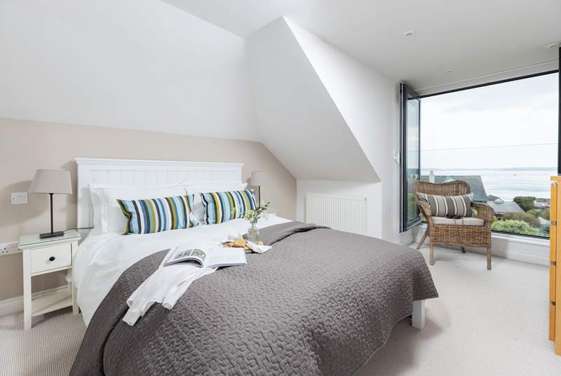 Sumptuous bedroom 4 takes full advantage of the views.